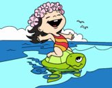 Petite fille avec une tortue de mer